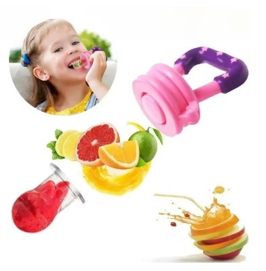 Child playing with a colorful fruit-themed toy set on a white background